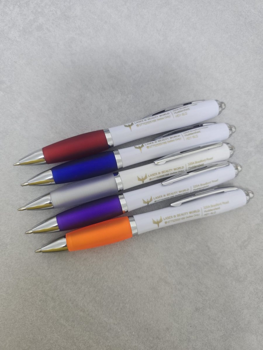 Laser and Beauty World branded pens on the reception desk