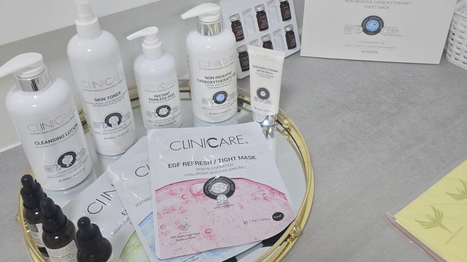 The CLINICARE professional skincare range on the counter in our treatment room